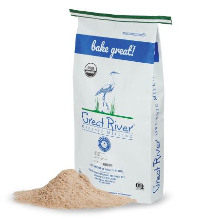 A bag of brown rice flour featuring a white bird, ideal for baking delicious bread.