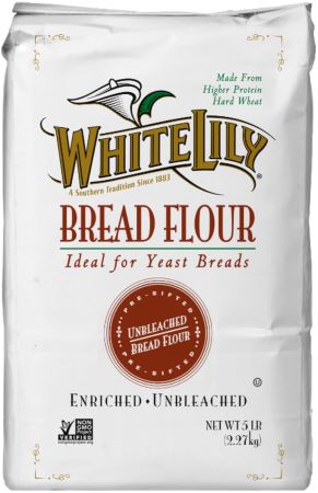A 4 lb bag of White Lily bread flour, renowned as the best flour for baking delicious bread